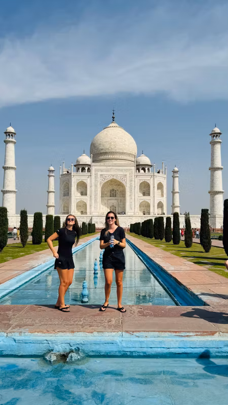 Delhi Private Tour - Caught in a fun moment while clicking memories at the Taj Mahal — because great visits deserve great laughs!