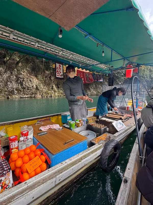 Kyoto Private Tour - Enjoy a snack while drifting on a boat