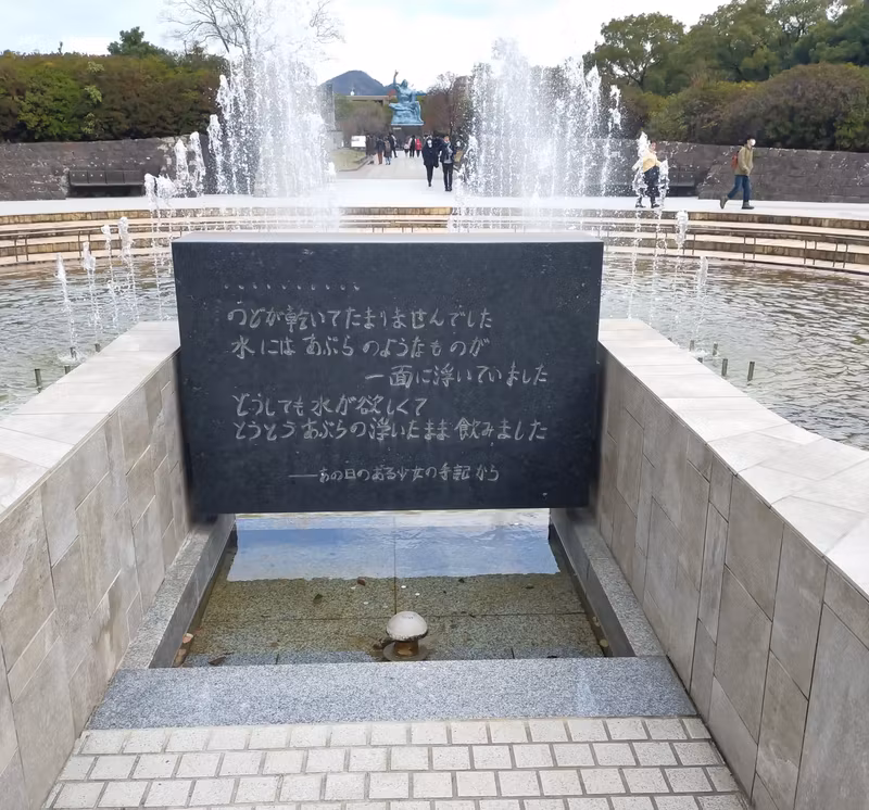 Nagasaki Private Tour - The peace park with the local sutatue