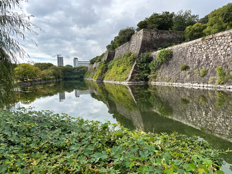 Osaka Private Tour - stone wall reflection on the moat