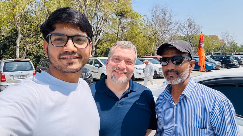 Delhi Private Tour - David from New York and I, all smiles at the Taj Mahal parking — excited for the wonder that awaits!