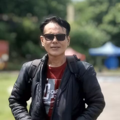 Jakarta Tour Guide - Adrie E.