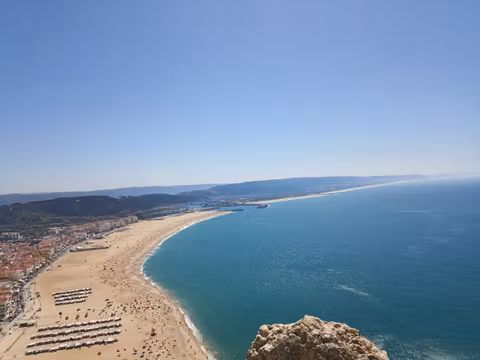 Private Transfer to Oporto with lunch at Nazaré in a Mercedes Benz (8 pax)cover image