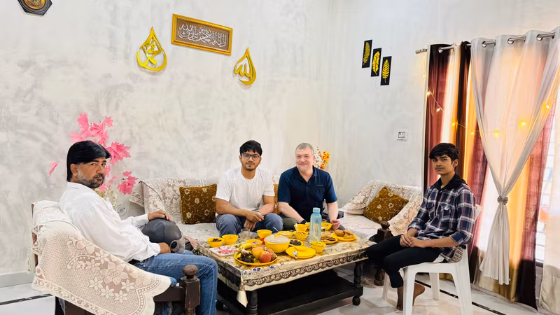 Delhi Private Tour - David from the USA enjoying the true taste of India — an authentic household meal filled with spices, stories, and smiles.