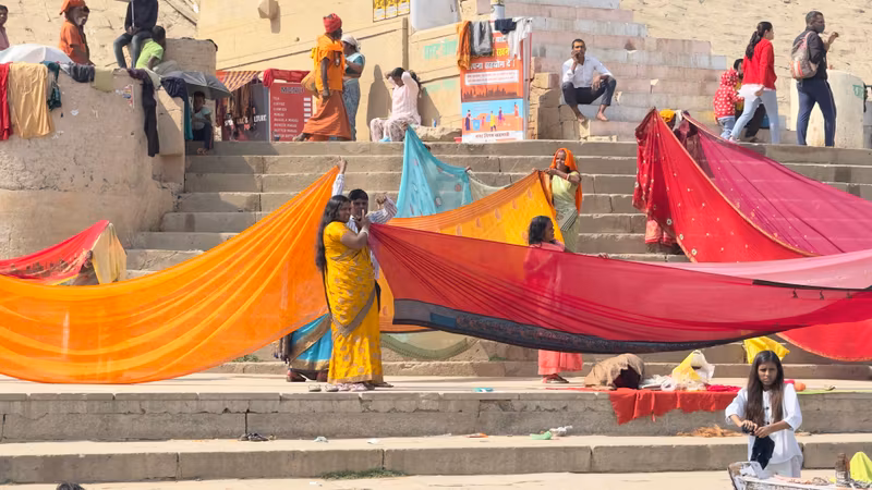 Agra Private Tour - Women putting cloths in sun to dry.