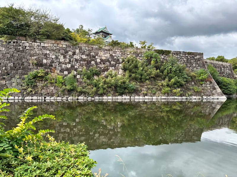 Osaka Private Tour - stone wall reflection on the moat