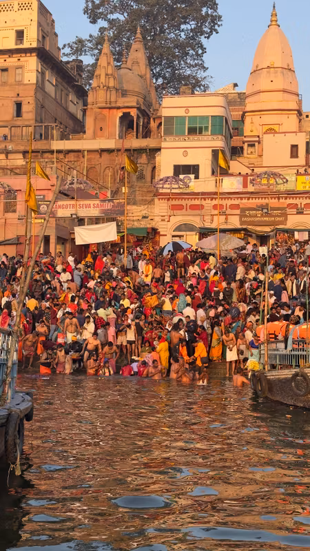 Agra Private Tour - People bathing in River Ganges in Varanasi.